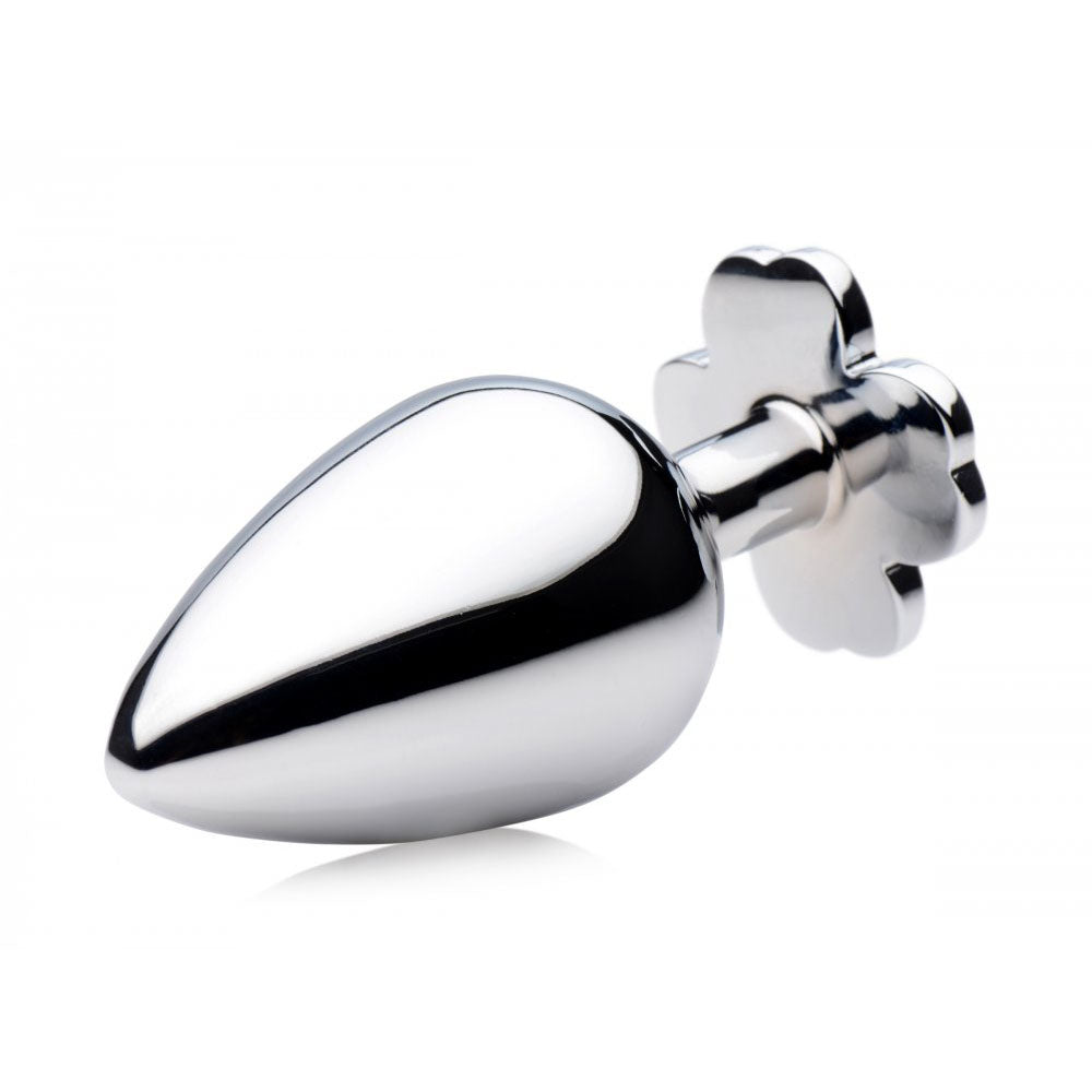 Side view of the silver-toned plug showing the tapered body, narrow neck, and clover-shaped base.