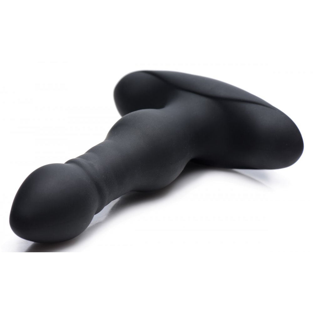 Black plug lying on its side to show the rounded bulb tip, ribbed shaft, and flanged base.