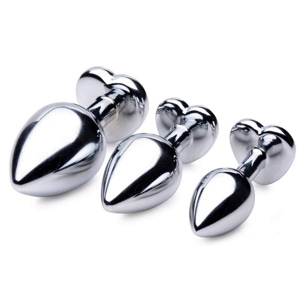 Red Heart Gem Metal Butt Plug Training Set viewed from behind to show smooth bodies and heart-shaped bases.
