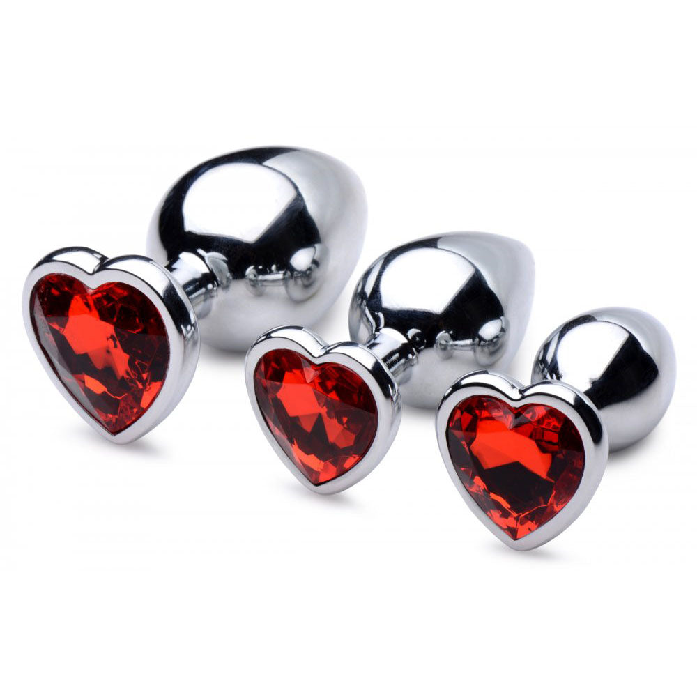 Red Heart Gem Metal Anal Training Set arranged from large to small with faceted heart bases facing forward.