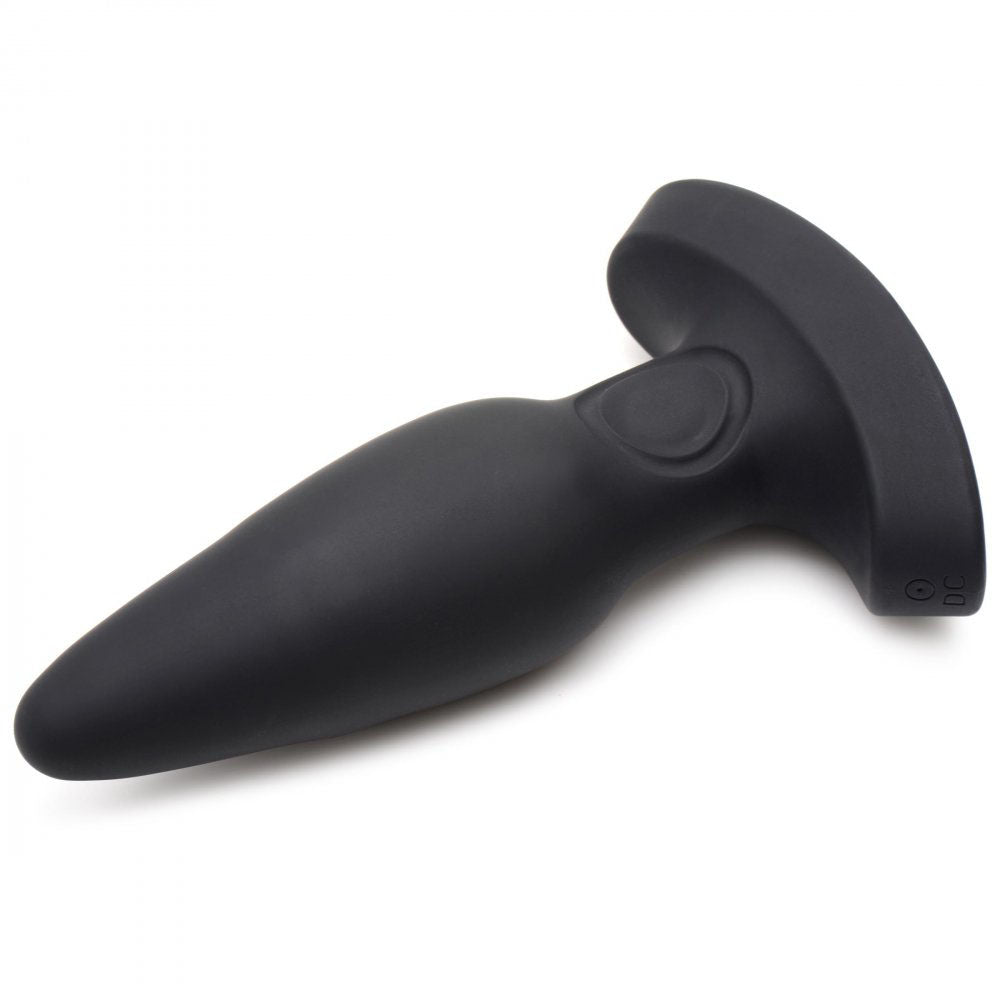 Angled black silicone butt plug with a tapered body, control button, and wide curved base.