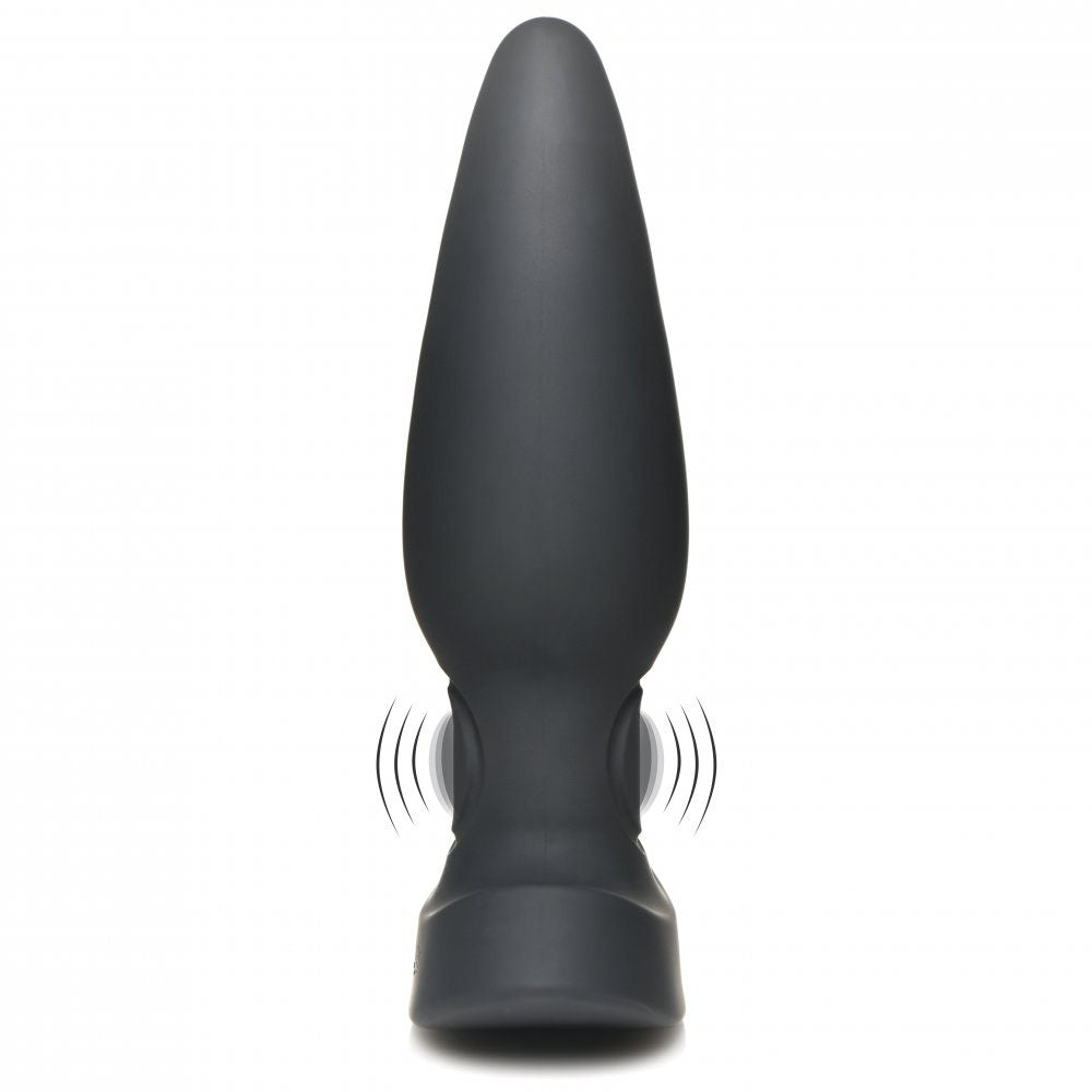 Black silicone butt plug standing upright with a wide base and vibration-line graphics on both sides.