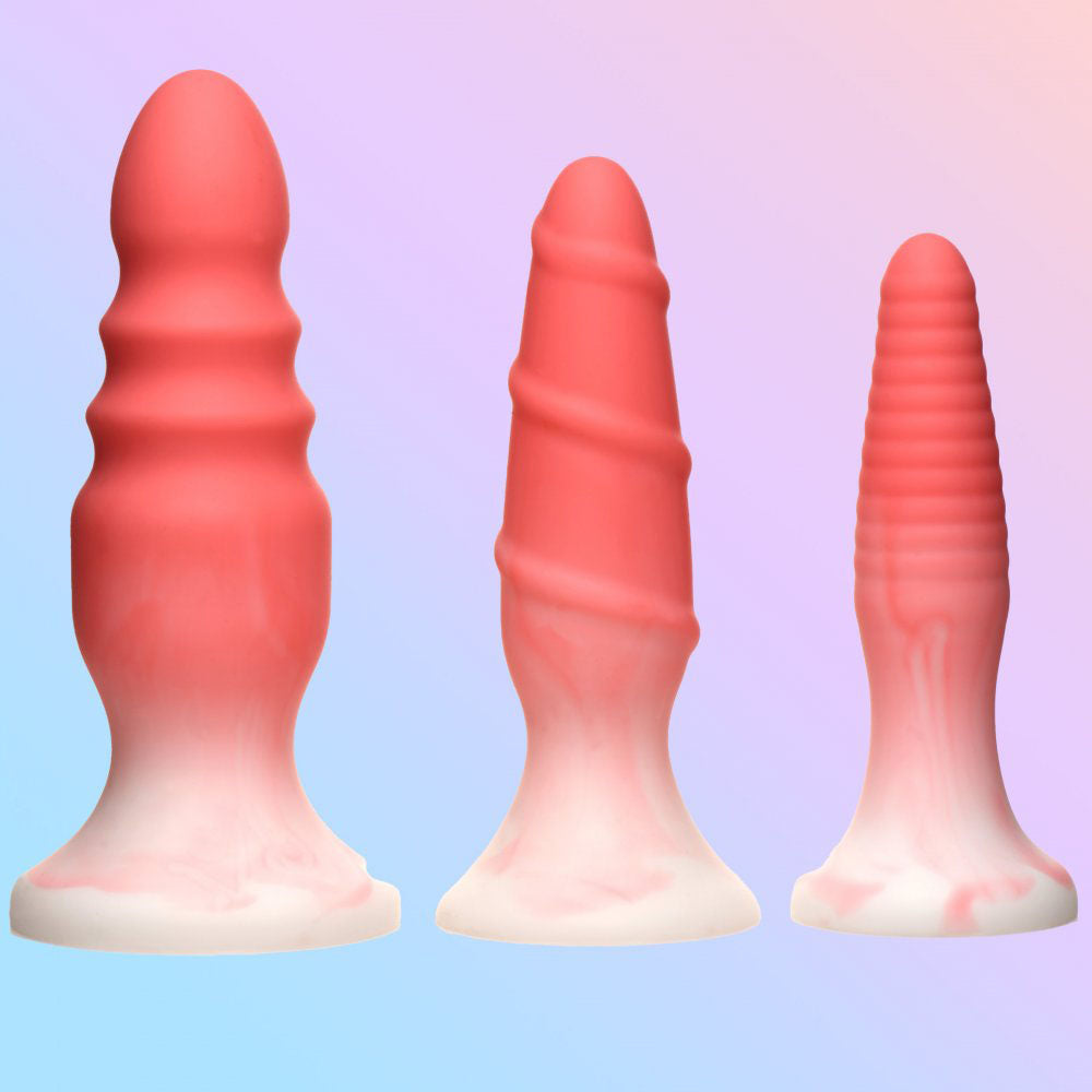 Pink graduated butt plug set with bumpy, spiral, and ribbed textures plus wide flanged bases.