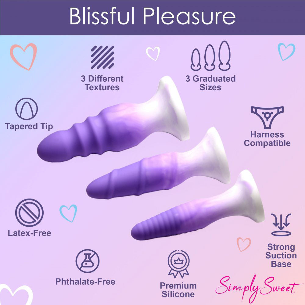 Feature graphic showing purple silicone plugs with three sizes, tapered tips, harness compatibility, and suction bases.