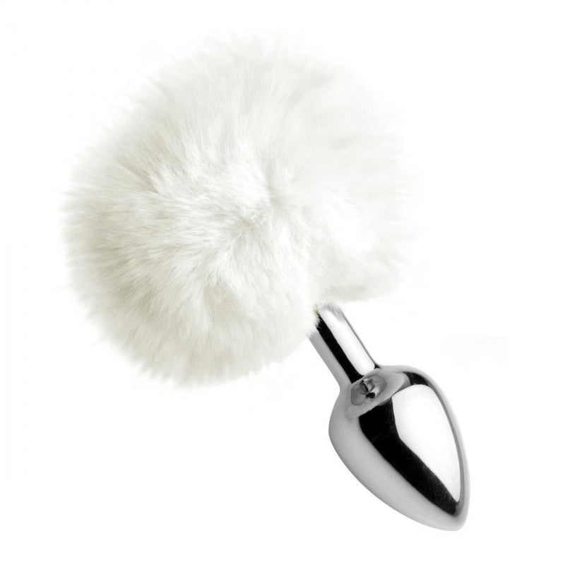White furry round tail attached to a reflective silver-colored tapered plug with a narrow neck.