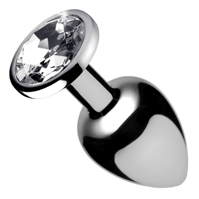 Angled silver-toned plug with tapered body, narrow neck, and clear gem top.