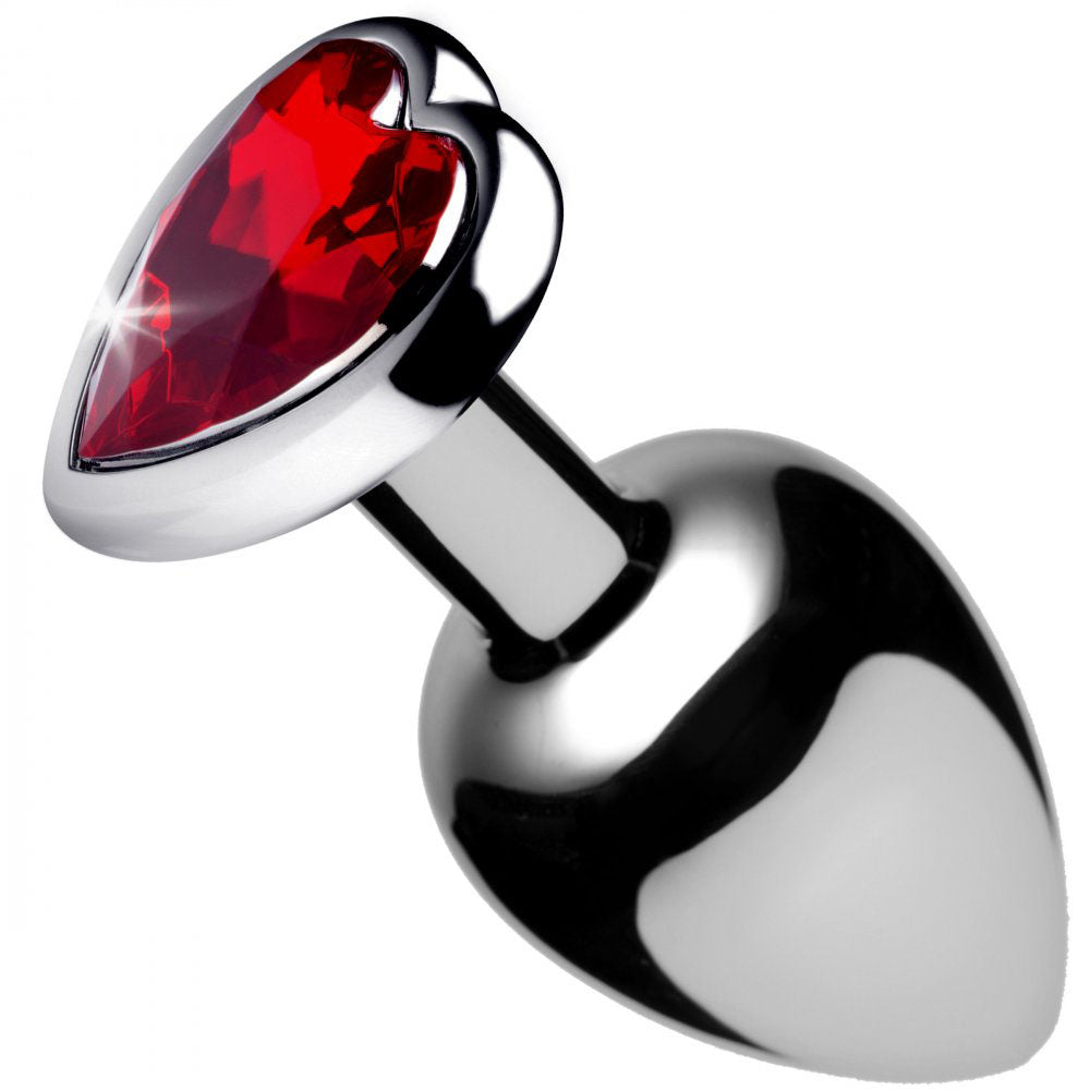 Angled polished metal plug with tapered body and heart-shaped red gem base