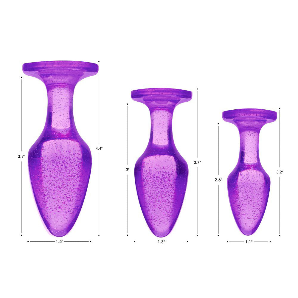 Size chart comparing the small, medium, and large purple glitter acrylic anal plugs.