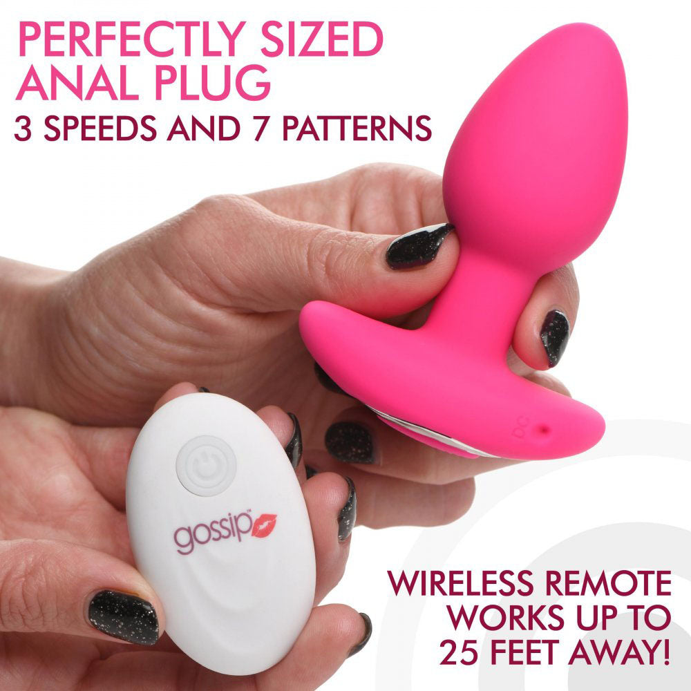 Hand holding a pink plug and white remote with 3 speeds, 7 patterns, and 25-foot range callouts.