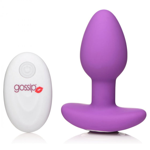 Upright purple plug beside a white remote on a white background.